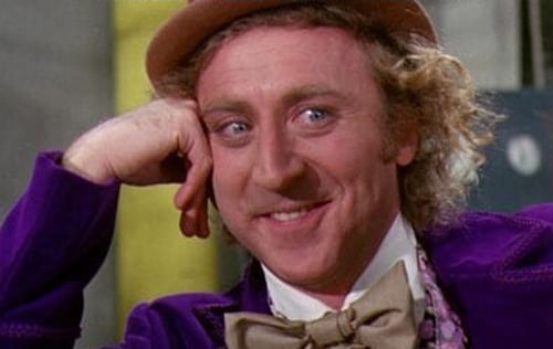 Gene Wilder as Willy Wonka giving a skeptical look