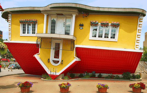 House displayed upside down to illustrate a flipped home