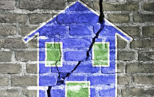 Illustration of a house with a crack representing a fixer-upper