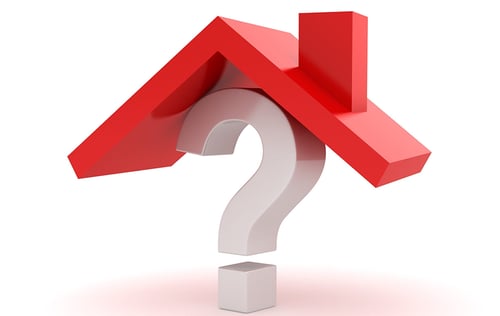 Question mark beneath a red roof symbolizing property disclosure questions